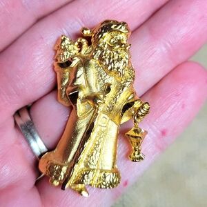 Vintage gold tone father Christmas brooch with a dangle lantern very cute